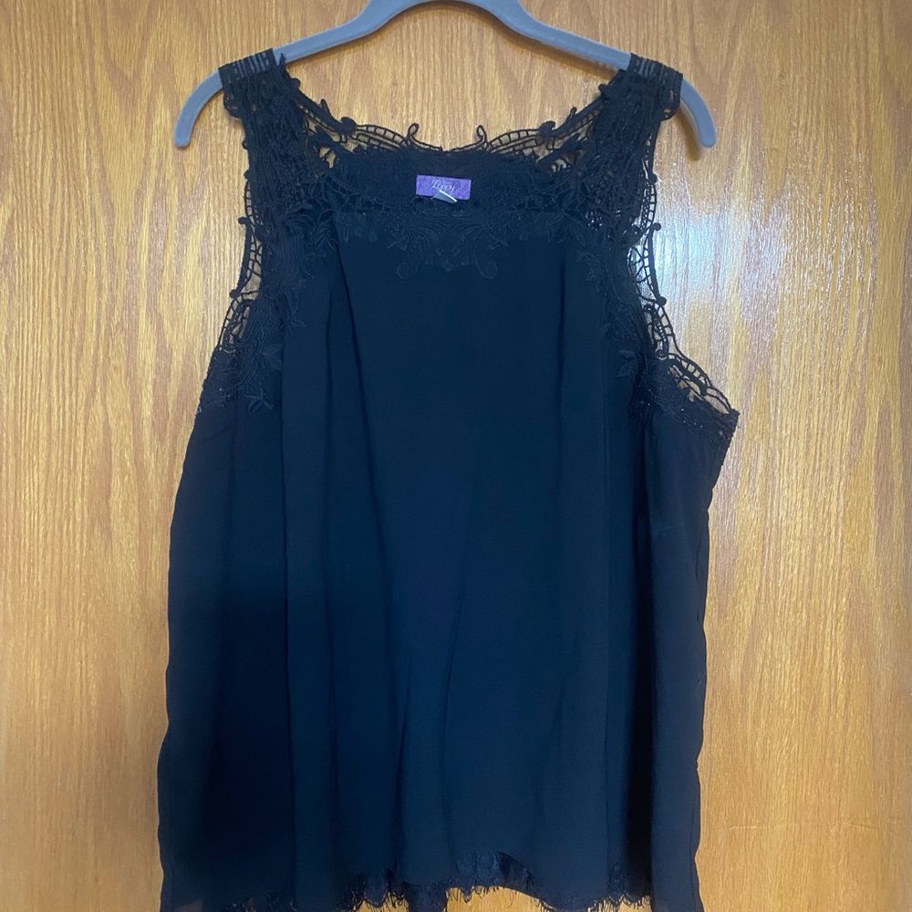 Black lace sleeveless top.